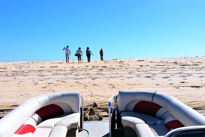 Ria Formosa Sunset 1 hour Boat Trip in Faro - Sunset, music, and the guide’s role