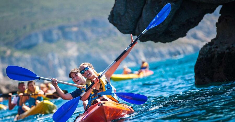 Sesimbra: Arrábida Natural Park Guided Kayaking Tour - Paddling beneath Arrábida’s limestone cliffs
