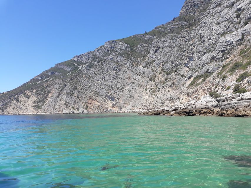 Sesimbra: Secret Bays and Beaches Boat Tour with Snorkeling - Ribeiro do Cavalo brings the classic beach view