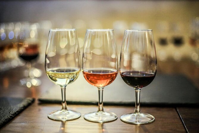 Setúbal Wine Tour with Visit and Tasting at 2 Wineries - Bacalhôa’s modern building, barrels, tiles, and art