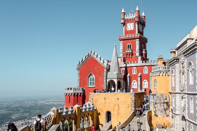 Sintra & Cascais Day Tour with Pena Palace Entry and Gardens Walk - Sintra village, pastries, and lunch