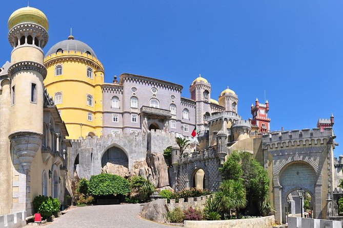 Sintra, Pena Palace, Quinta da Regaleira & Cascais Group Tour - Estoril on the return drive