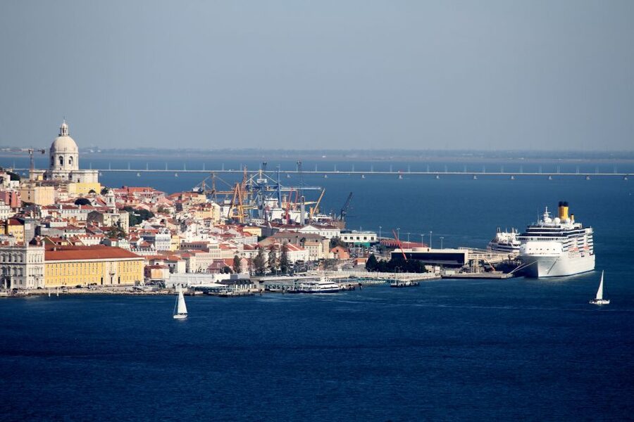 South Lisbon: 3-Hour Christ the King Electric Bike Tour - Cais do Ginjal, a waterfront with working roots
