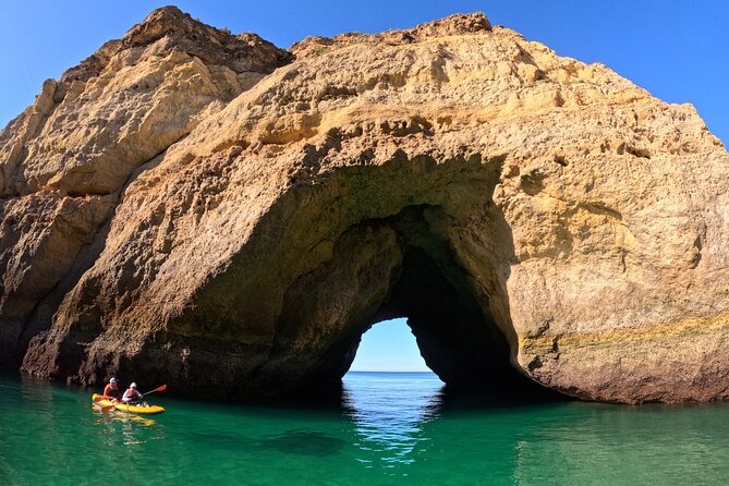 Sunrise Small Group Kayak Experience in BENAGIL Cave & 4K Photos - Starting through Carvalho Beach’s old rock tunnel