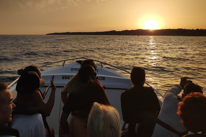 Sunset Benagil Caves Boat Tour from Armacao de Pera - Entering the Benagil Caves near sunset