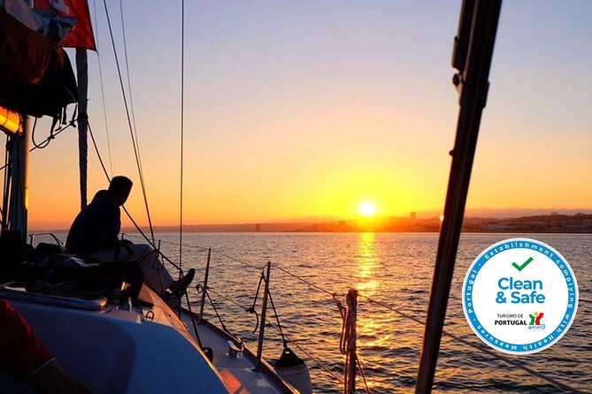 Sunset Sailing Tour On The Tagus River - Passing beneath the 25th of April Bridge