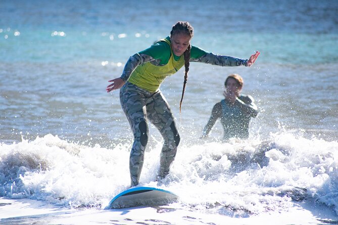 Surfing Lessons in Madeira - Getting into the wetsuit and onto the board